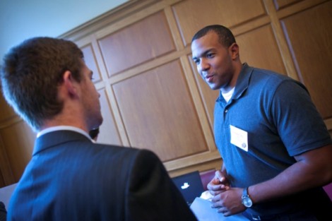 Jason Mills '09 of  Pepco Holdings Inc talks with students.