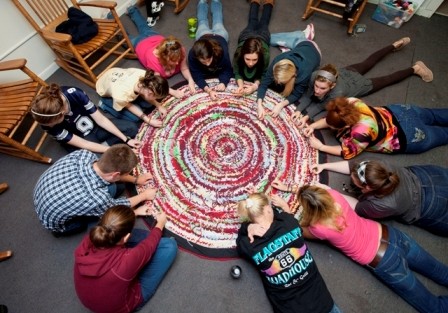 Through the Journey Home program, Lafayette students and female inmates from Northampton County Prison held an informal discussion group and put the finishing touches on a rug made of recycled Lafayette T-shirts. 