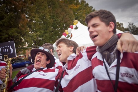Members of the Leopard Pride Andrew Rowland '13, left, Scott Albert '13, and Matt Mezger '13 sing along with the band UUU.