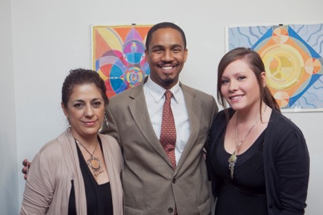 Artist Karima Muayes, left, poses with John McKnight, dean of intercultural development, and curator Anna Schaefer. 