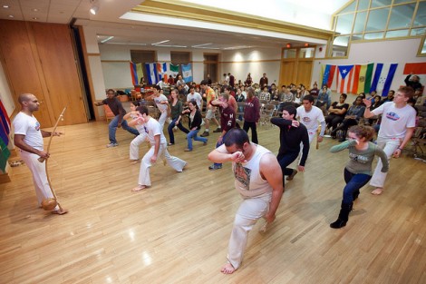 Students and members of Abada-Capoeira perform some movements.