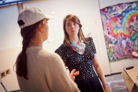 Ellen Rose '09 talks about art with Katie O'Neall '12.