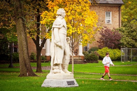 The Wanamaker statue of the Marquis de Lafayette behind Hogg Hall