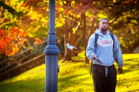 Emery Young '13 walks past Pardee Hall.