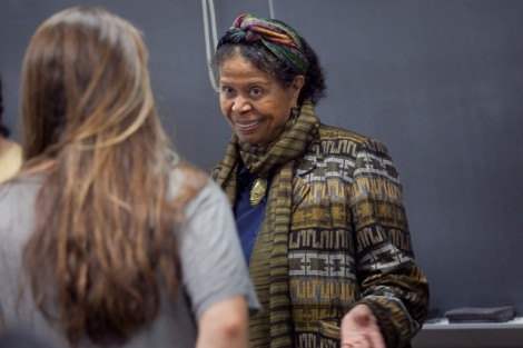 Jayne Cortez, right, talks about her poetry with students in the creative writing course taught by Elizabeth Rosen, visiting instructor of English. 
