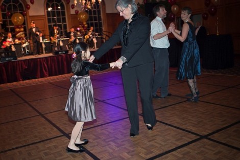 Provost Wendy Hill dances with her daughter.