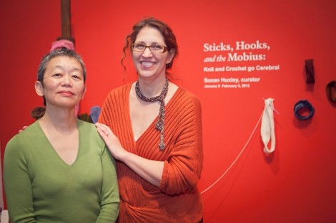 Michiko Okaya, director of Lafayette art galleries, and curator Susan Huxley by the exhibition entrance