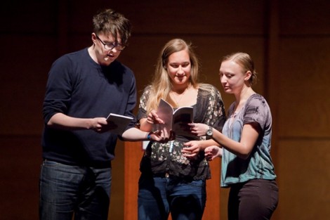 Poet Matthew Dickman reads from his works with the help of Rebecca Martini '12, center, and Sam  Griffith '13, right. 