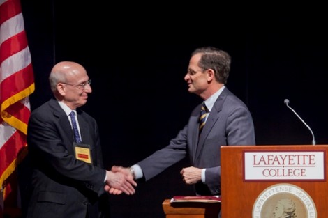 President Daniel H. Weiss, right, greets Eugene M. Tobin, program officer for the Higher Education and the Liberal Arts Colleges Program at The Andrew W. Mellon Foundation.
