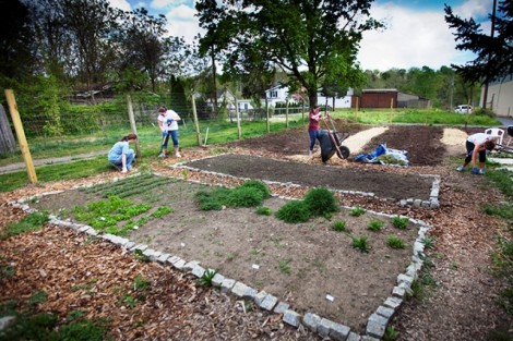 Students work at the West Ward Neighborhood Partnership's Lynn Street community garden.