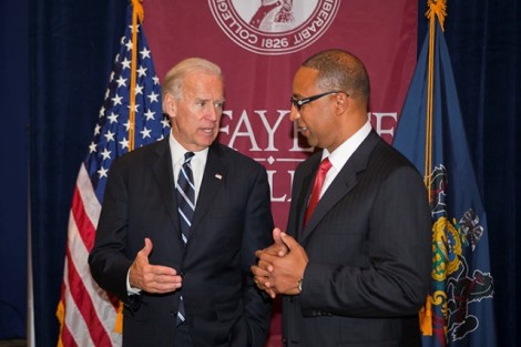 Vice President Joe Biden speaks with George Bright, associate director of athletics.