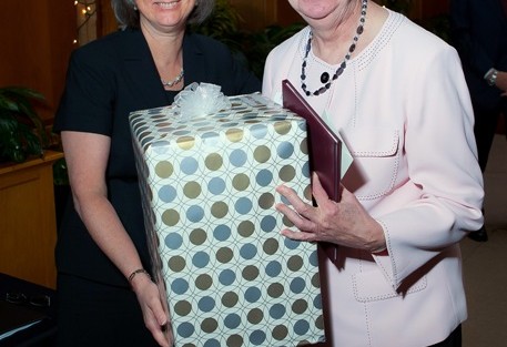 Provost Wendy Hill, left, with Helen Dungan, who is retiring as cataloging librarian