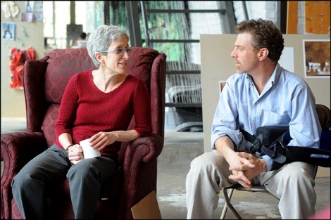 Artist Nancy Cohen speaks with Jim Toia, director of the community arts program.