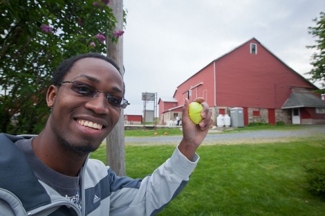 Brian Asingia '12 holds up one of the Easter Eggs he collected.