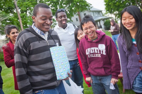 Raymond Macharia '15 picks out a prize from the Easter Egg hunt.