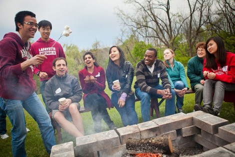 Students roast marshmallows.