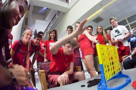 Willem Ytsma '16 drops his piece in while playing a game of Connect 4 at Kirby Sports Center.