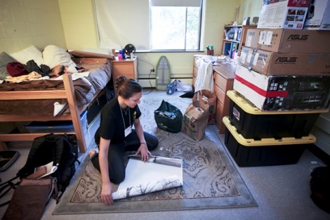 Conway House resident assistant Diana Giulietti '13 gets her room ready.
