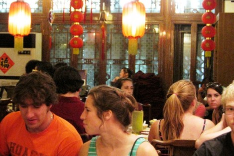 (From left) James Kugel 13 and Hanna Sotiropoulos '14 attend the traditional Chinese arts performance at a Chinese tea house.