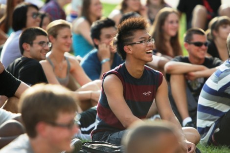 Students watch the orientation leaders perform.