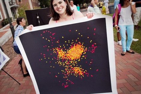 Nicole Tchorowski '14 shows off her artwork. 