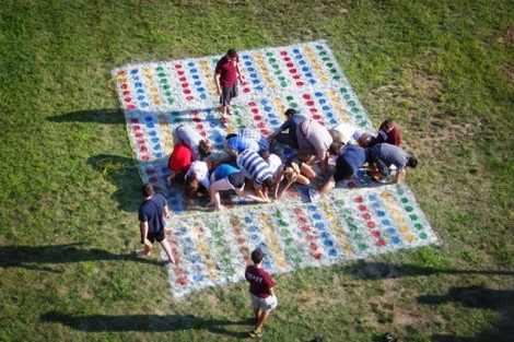 Students play a giant game of Twister on the Fisher Quad.