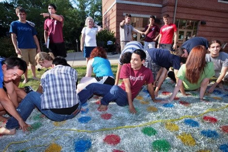 Students play a giant game of Twister on the Fisher Quad.