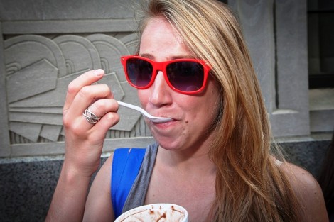 Alexandra Von Arx '13 eats some ice cream as she watches the donut-eating contest.