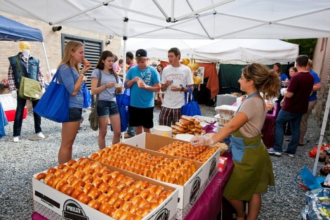 Students enjoy free Philly soft pretzels at the Lafayette Day celebration in the Bank Street Alley in downtown Easton.