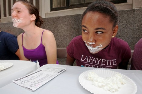 Mariela Gratero '15 gets a face full of pie during the pie-eating/bubble gum-blowing contents.