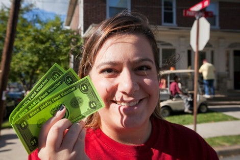 Elizabeth DiSabatino '16 displays her food coupons.