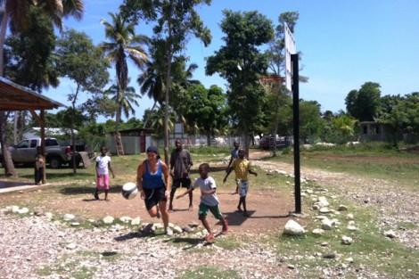Jess Rothstein '13 plays soccer with kids at the Children of Hope Orphanage. 