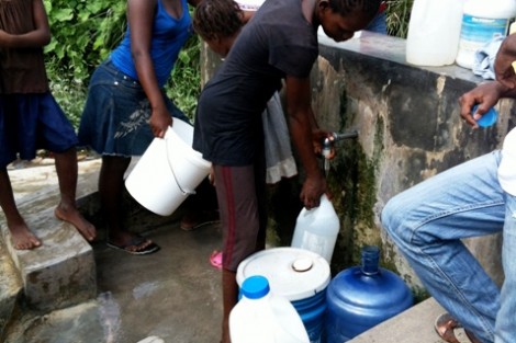 Many Haitians walk over a mile each day to get water from this well.