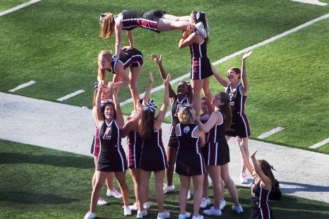 Lafayette cheerleaders do a pushup for every point scored against Holy Cross.