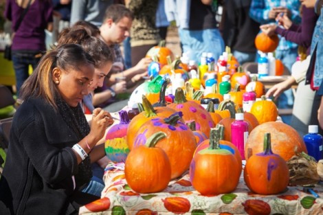 Mariela Gratero '15 decorates some pumpkins. 