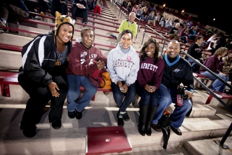 Charnelle Pinkett '13, l-r, watches the game with her grandmother, Joyce Lorkins, her mom, Michelle Pinkett, Brandi Porter '13, and Michelle Pinkett's fiancé, Anthony Frost.