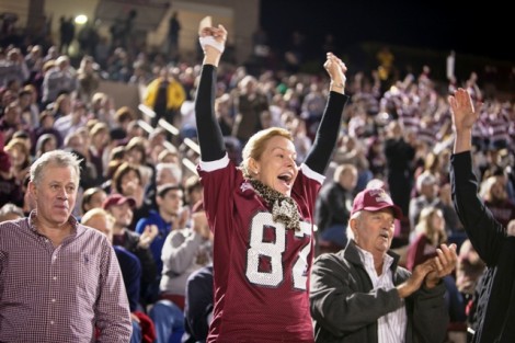 Cindy Duncan, the mother of wide receiver Michael Duncan ’15, celebrates a good play. 