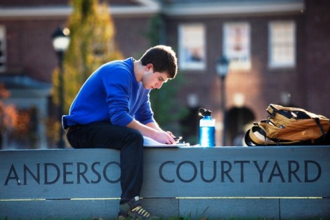 Andrew Rose '13 studies in the Anderson Courtyard.
