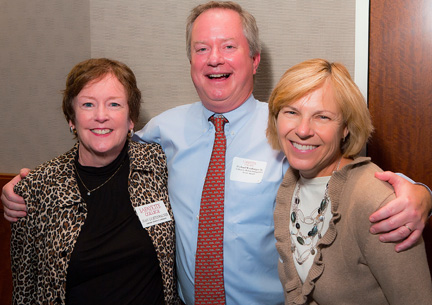 Michael Weisburger '82 wins Wilson Distinguished Service Award for his dedication to the Alumni Admissions Representatives program. Joan Lichtenwalner (left) and Carol Rowlands '81 congratulate him.
