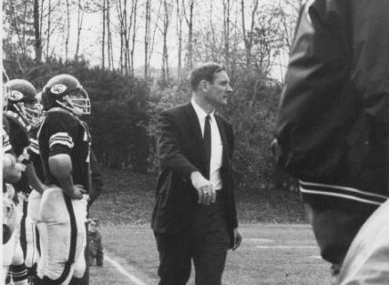 Head coach Harry Gamble watches from the sideline during the 1969 game.