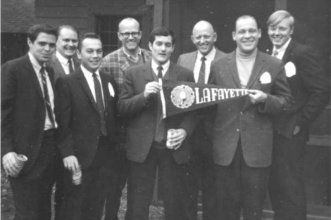 Terry Burton '65, l-r, Hunt Garbee '56, Joe Emig '59, Dave Patterson '59, Dan Edson '68, Dave Davis '59, Bob Harkel '49, and George Bergstrom '70 pose before the 1968 game.
