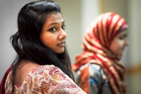 Amira Ahsan ’13 listens to the discussion.