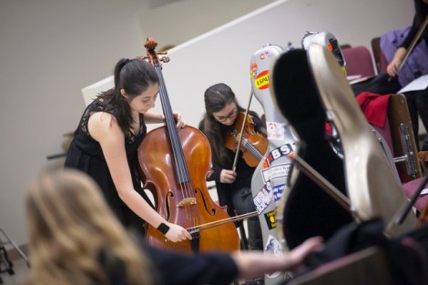 Students prepare for the concert backstage.