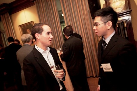 Matthew Aaron ’10, left, shares some wisdom with Yue Yin ’14.