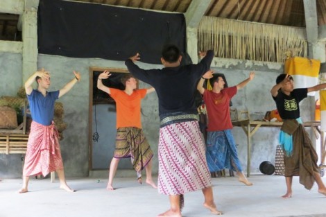 Martin Adams '13, l-r, Willem Ytsma '16, and Derek Vill '14 learn traditional men's Balinese dance movements.