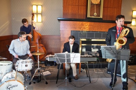 The all-alumni jazz band The Jack Furlong Quartet entertains the students.