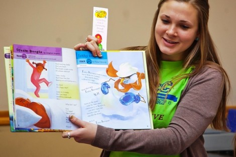 Caroline Ladlow '16 helps the kids 'dissect' a book. 