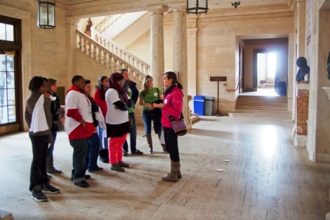 Dena Inqui '13, right, gives some Easton-area teens a tour of the Kirby Hall of Civil Rights.