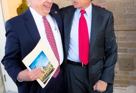 Edward W. Ahart ’69, chair of the Board of Trustees, left, speaks with Richard A. Grossman ’64.