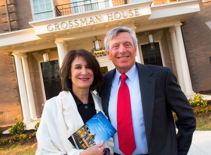 Rissa Welt Grossman and Richard A. Grossman ’64 outside Grossman House